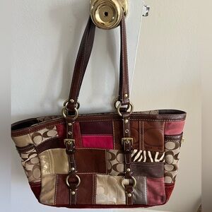 Coach patchwork purse. Excellent condition, clean interior! Fun, vintage look